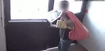 Apartmanın bodrum katından otomobil malzemesi çalan şahıs kamerada