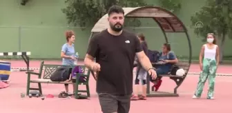 Milli çekiççi Özkan Baltacı, sakatlığına rağmen Tokyo 2020 hazırlıklarını sürdürüyor