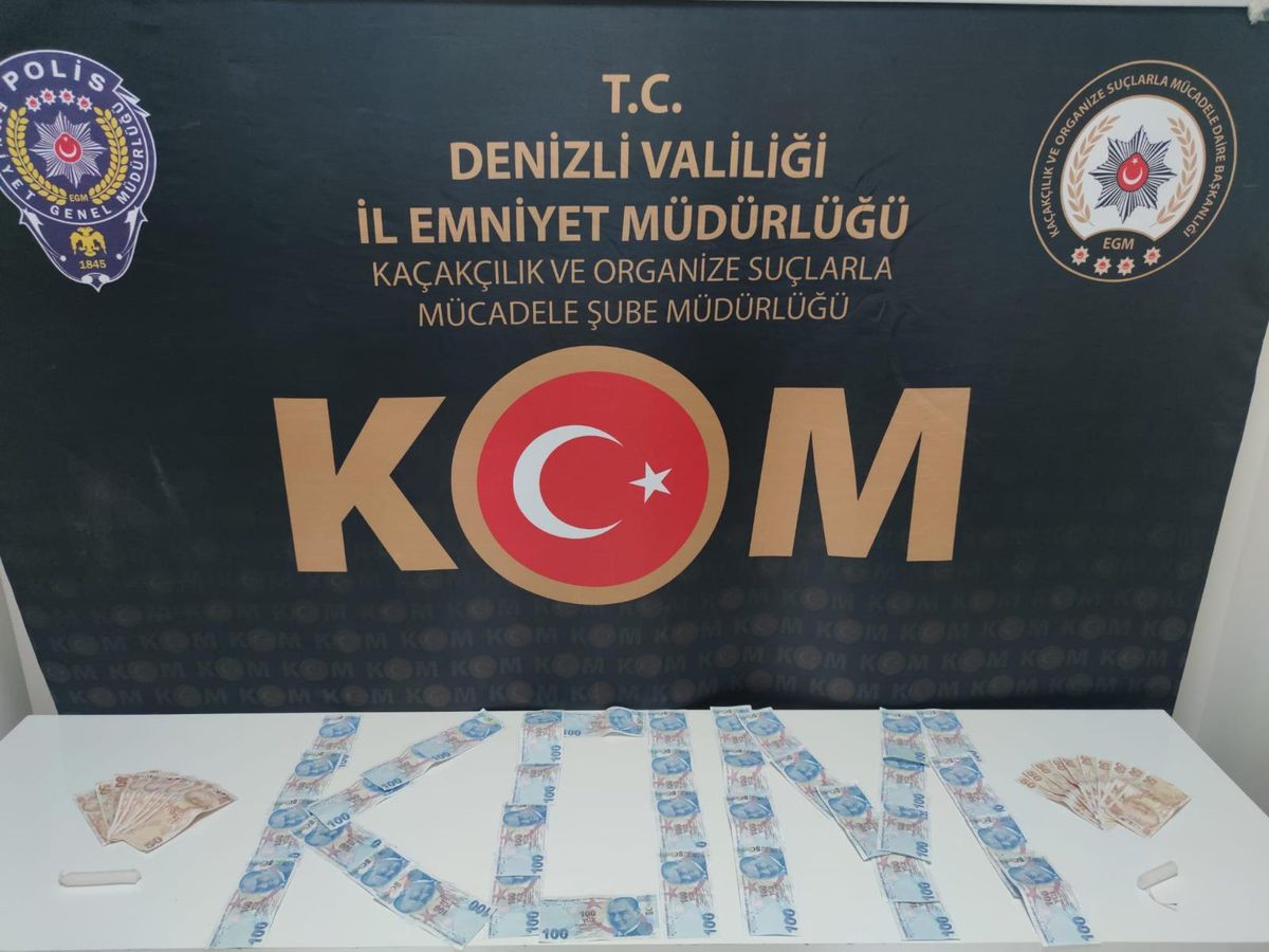 Denizli\'de sahte paraları mumlayarak piyasaya sürmeye çalışan 2 zanlı yakalandı