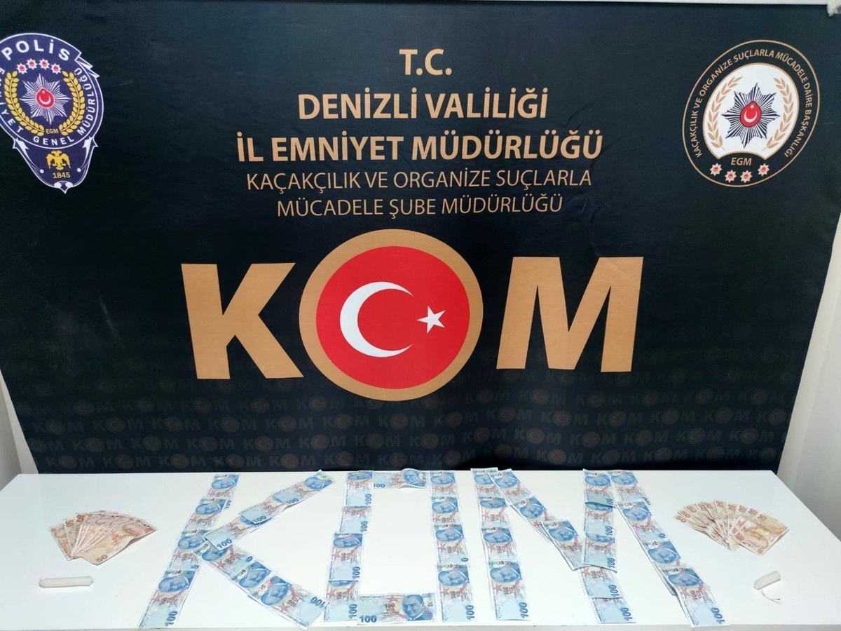 Sahte paraya orijinal hissi vermek için mum kullanmışlar