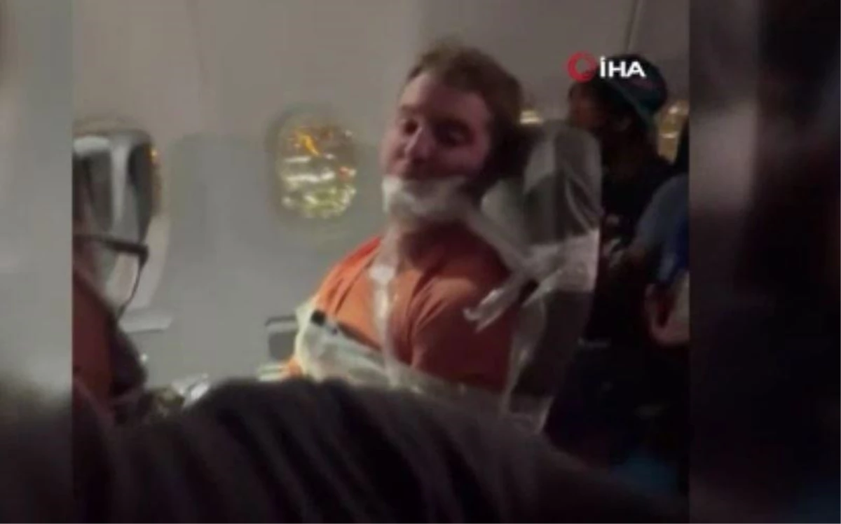 ABD\'de uçakta hostesleri taciz eden yolcu, koltuğa bantlandı