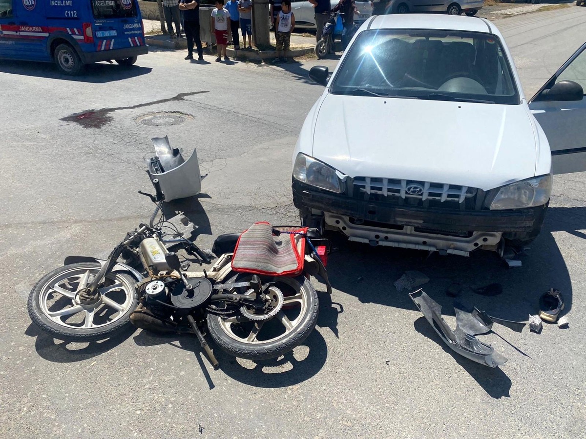 Otomobille çarpışan motosiklet sürücüsü yakalandı