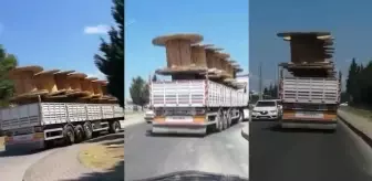 Palet taşıyan tırın tehlike saçtığı anlar kamerada