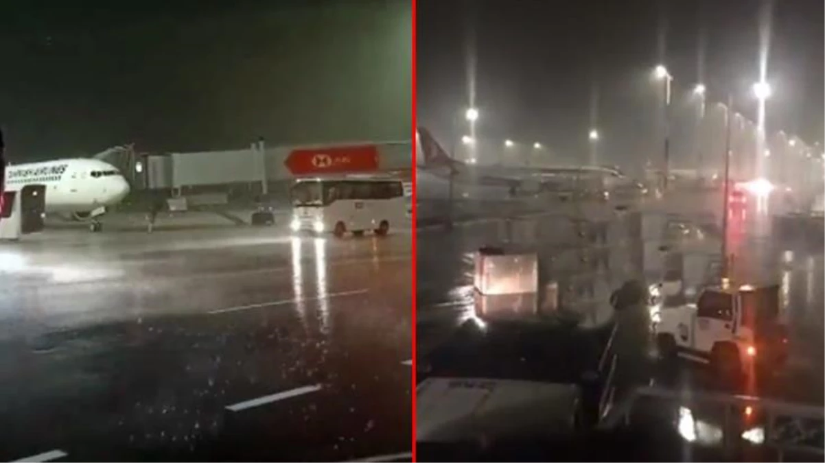 İstanbul Havalimanı\'nda başlayan şiddetli fırtına bagajları, konteynerleri sürükledi