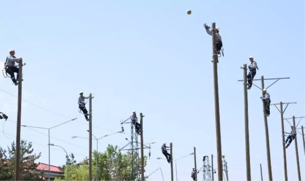 Electricians playing volleyball on top of poles for balance training