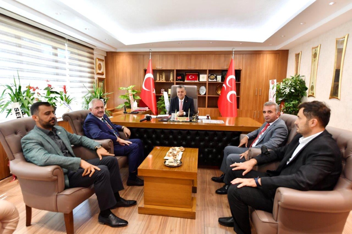 Nursaçan ve yönetim kurulu üyeleri MHP İl Başkanı İncetoprak\'ı ziyaret etti