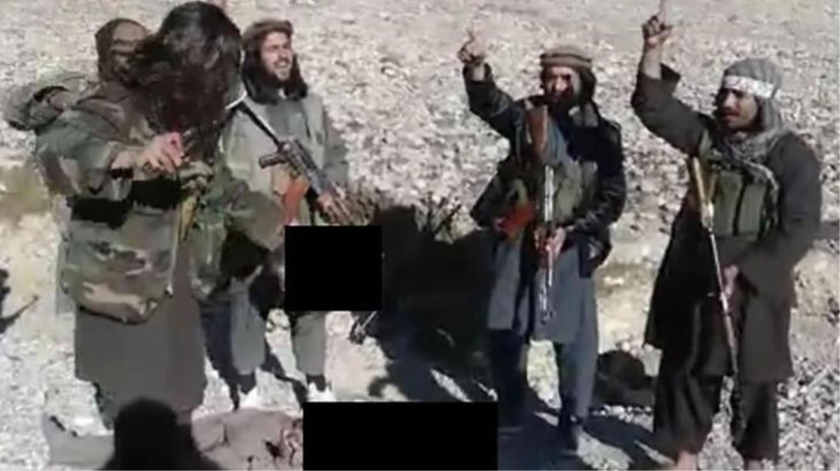 Taliban\'ın infazı tüyler ürpertti! Askerin başını kesip kutlama yaptılar