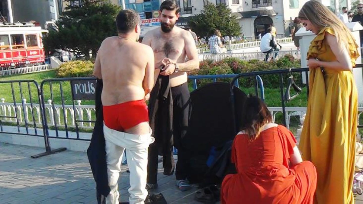 İranlı çift, Taksim meydanında kıyafet değiştirip fotoğraf çektirdi