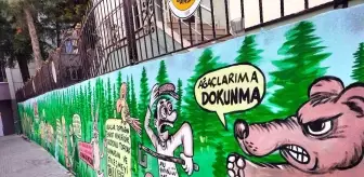 Bahçe duvarlarına çizilen karikatür ile ormanların önemi anlatıldı