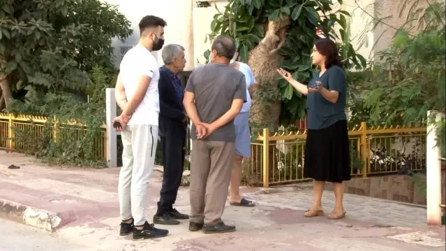 Balkondan düşen yaşlı adamı, alt komşusu tutarak ölümden kurtardı