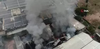 Küle dönen tekstil fabrikasındaki soğutma çalışmaları böyle görüntülendi