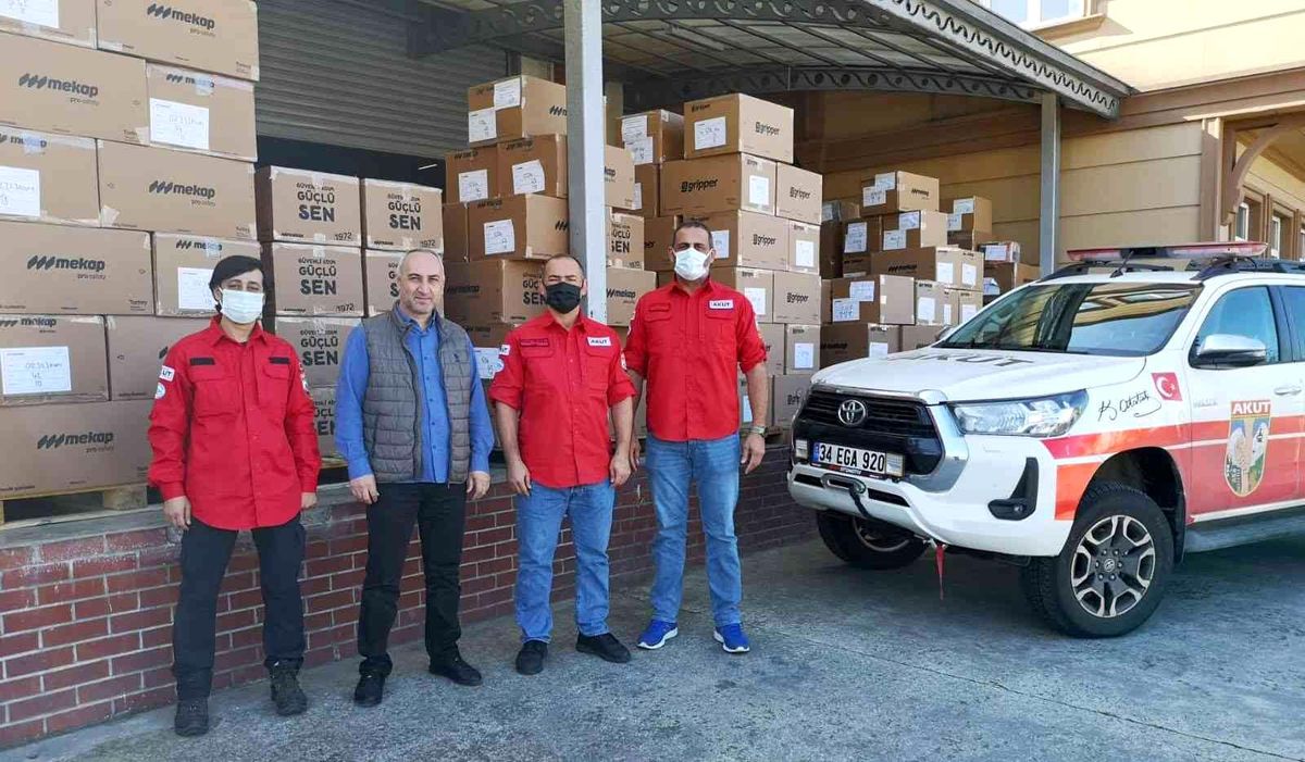 MEKAP\'tan AKUT\'a iş ayakkabısı bağışı