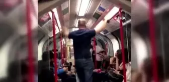 Metroda Asyalı kadına saldırmaya çalışan adama yolcular müdahale etti