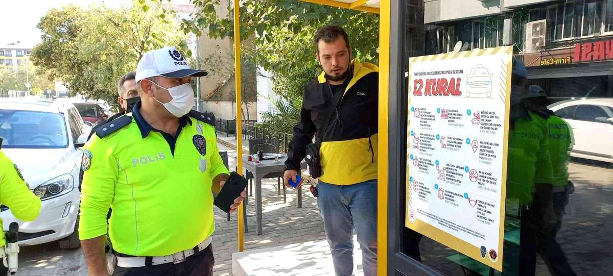 Taksi şoförüne \'12 Kural\' afişleri asıldı