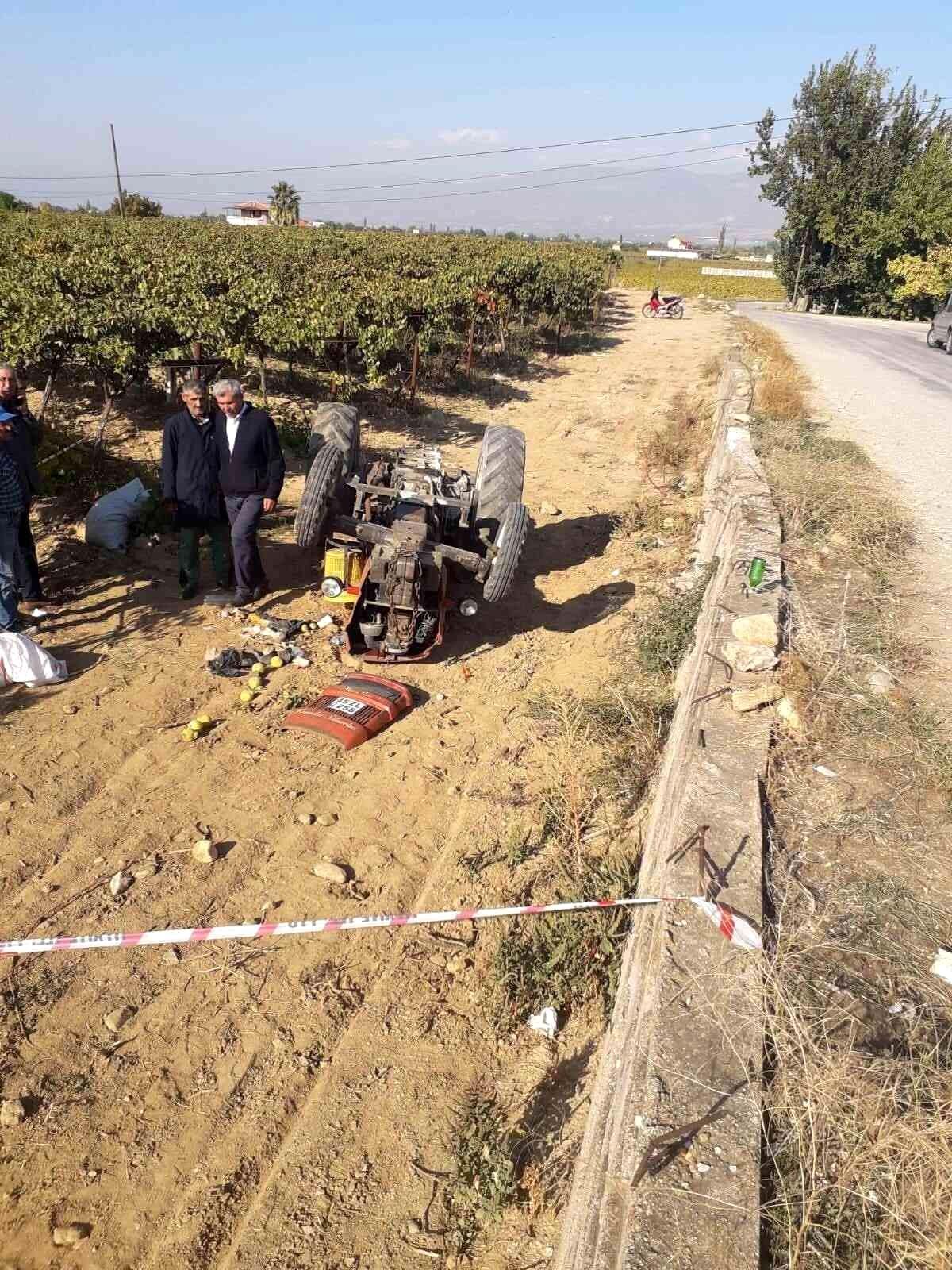 Devrilen traktörün altında kalan sürücüsü yaralandı