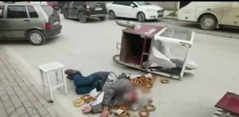 Lodostan devrilen simit arabasının altında kalan seyyar satıcı yaralandı