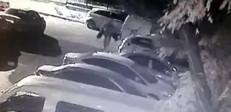 Otomobillerin lastiklerini çalan hırsız kamerada