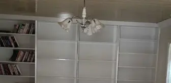 Aydın'da firari hükümlü, evindeki kitaplığın gizli bölmesinde yakalandı