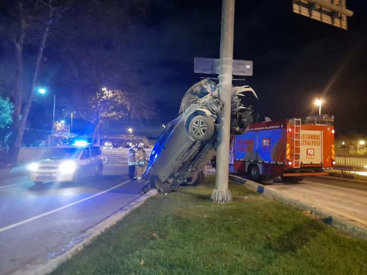 Car left hanging on the signpost in Istanbul