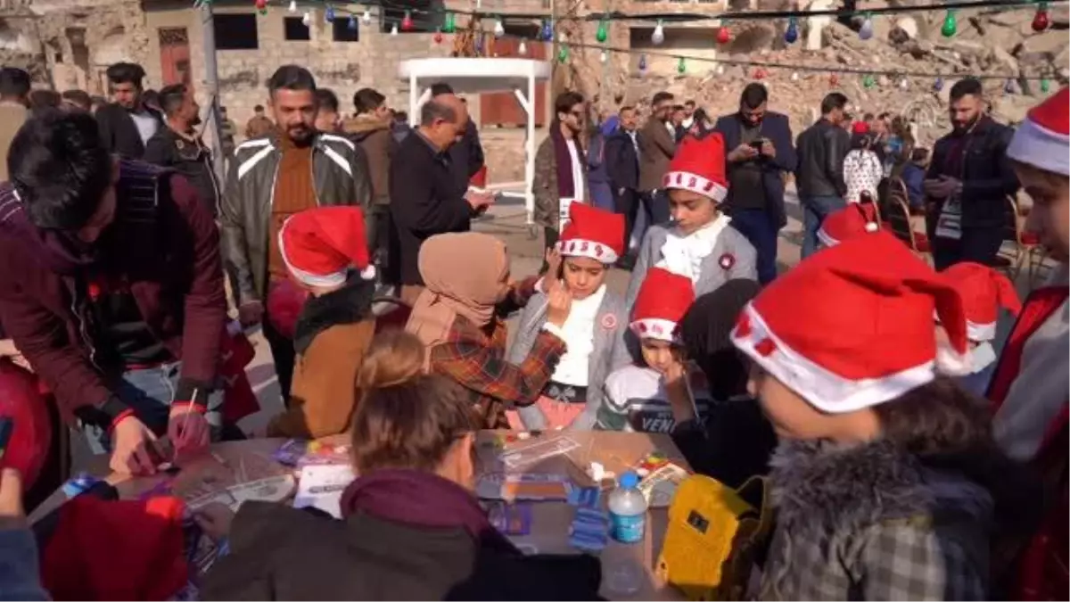 Son dakika: Terör örgütü DEAŞ\'ın harabeye döndürdüğü kentte yılbaşı etkinliği yapıldı