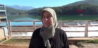 BARAJDAN TAŞAN SUYUN MANZARASINI ÇEKMEK İÇİN YARIŞTILAR