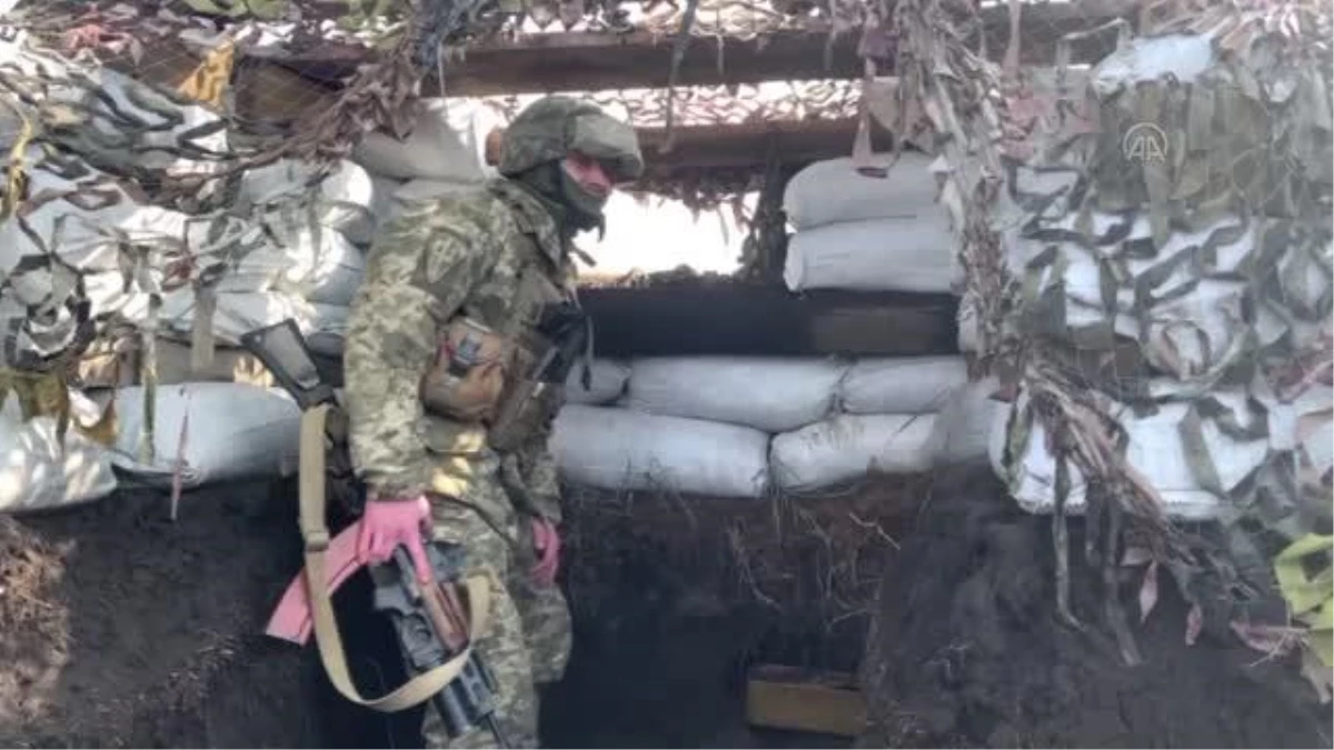 Son dakika haber | Rusya\'nın tanıma kararının ardından Ukrayna askerlerinin cephe hattında bekleyişi