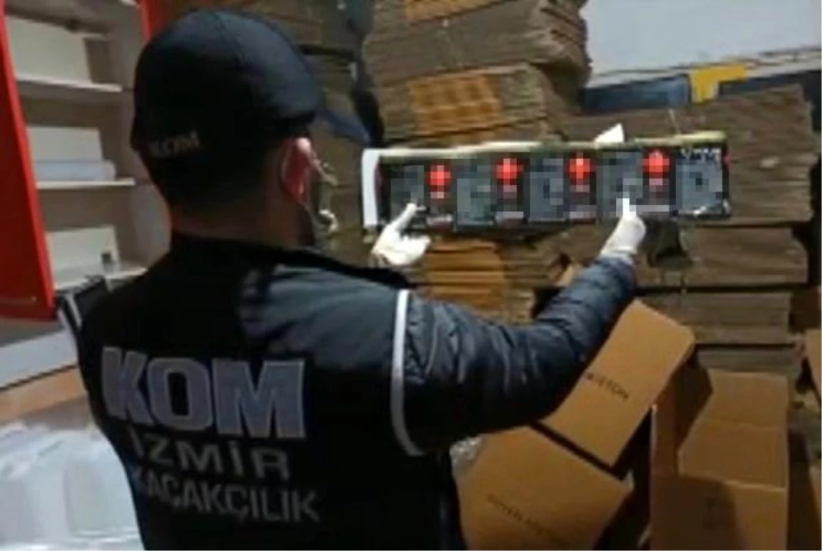 İzmir\'de sahte etil alkol imalathanesine polis baskını... 11 bin litre sahte etil alkol ele geçirildi