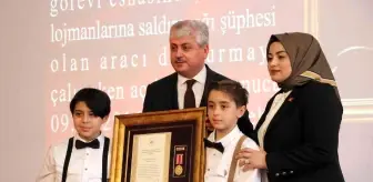 Hatay'da, şehit yakınları ve gazilere Devlet Övünç Madalyası ve Beratı verildi