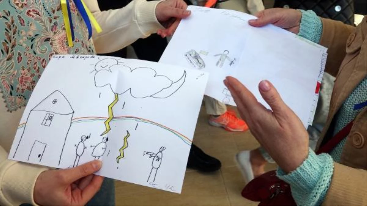 Graves, blood, and weapons in the paintings drawn by Ukrainian children