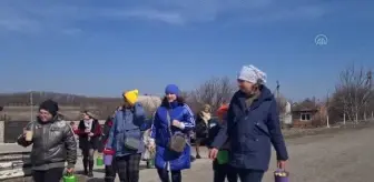 Ukrayna'da savaştan etkilenen çocuklara evcil hayvan terapisi