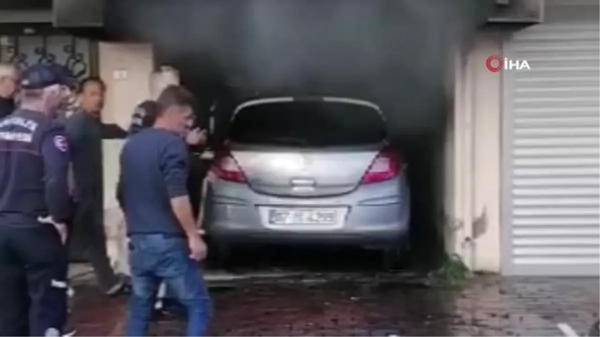 Bina altında kapalı garajda yanan araç paniğe sebep oldu