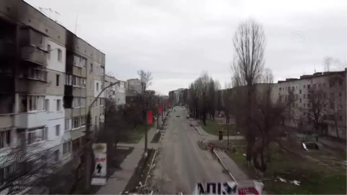 Son dakika gündem: Ukrayna'da harabeye dönen Borodyanka'da halk yemeklerini sokakta yaktıkları ateşte pişiriyor