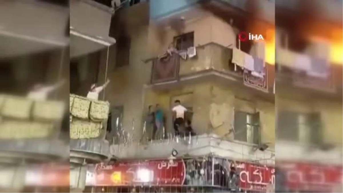Mısır\'da alevlerin ortasında kalan çocuk balkondan atladı