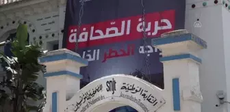 Son dakika... Tunuslu gazeteciler, Aljazeera muhabirinin öldürülmesini protesto etti