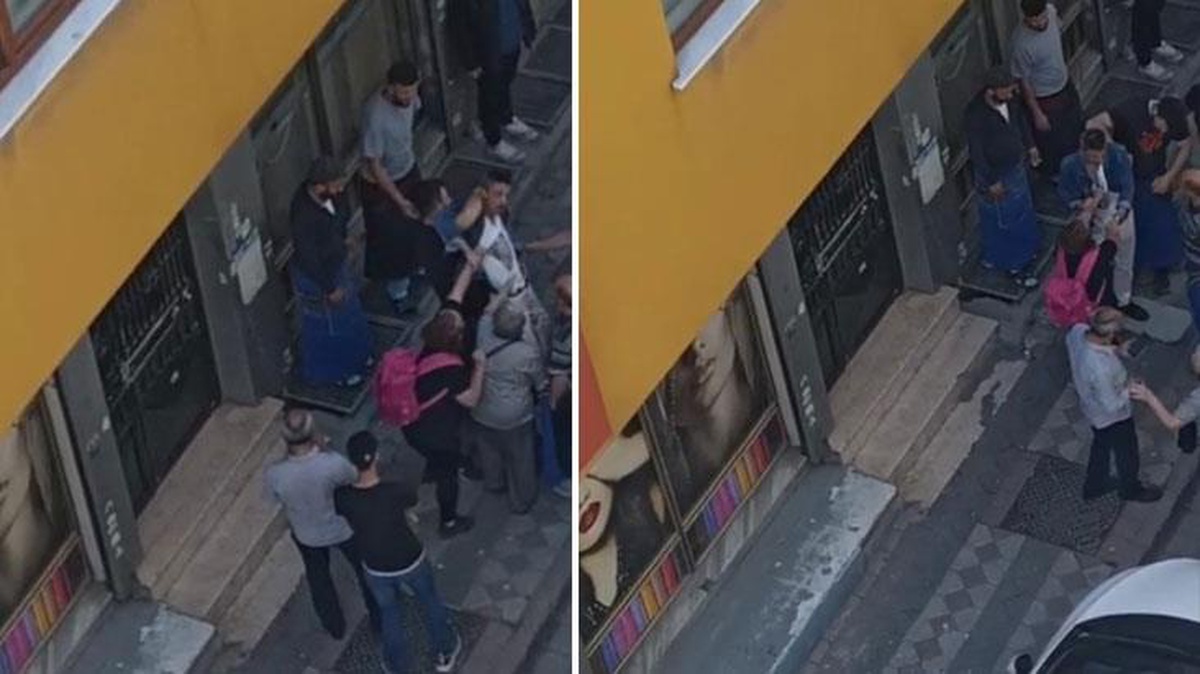 Sokak ortasında eşi tarafından dövülen kadının "polisi çağırın" haykırışına pazar esnafı yetişti! Kadın, polis gelene kadar kocasını yakasından tuttu
