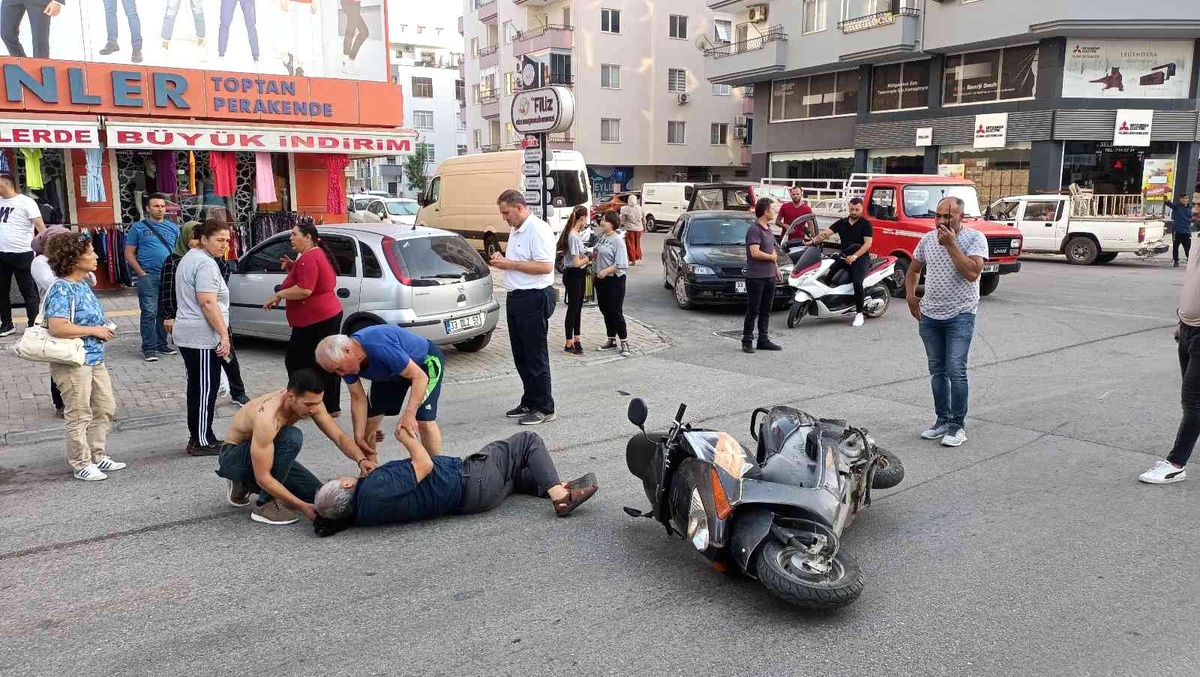 Motosiklet sürücüsü köpeğe çarpmamak isterken düşerek yaralandı