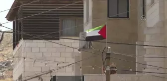 Batı Şeria'daki Huvvara beldesinde Filistinliler ile yerleşimciler arasında 'bayrak' gerginliği yaşanıyor