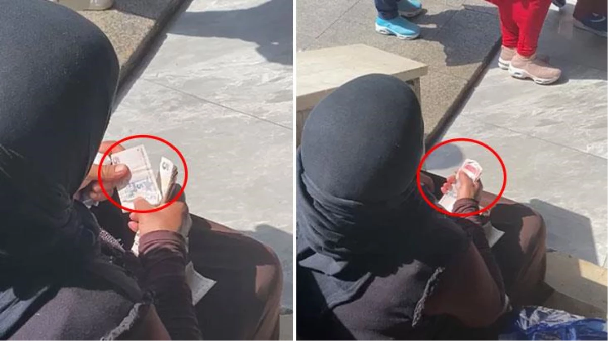 İstanbul\'da para toplayan dilenci, gün sonunda merdiven kenarına çömelerek hasılatı saydı