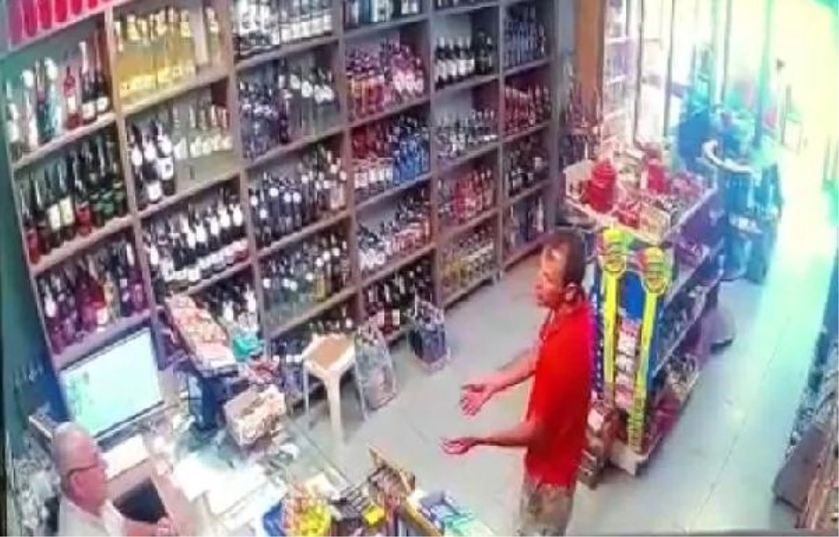 Marmaris\'te orman yakan şüpheli, veresiye içki vermeyen marketçiyi tehdit etmiş