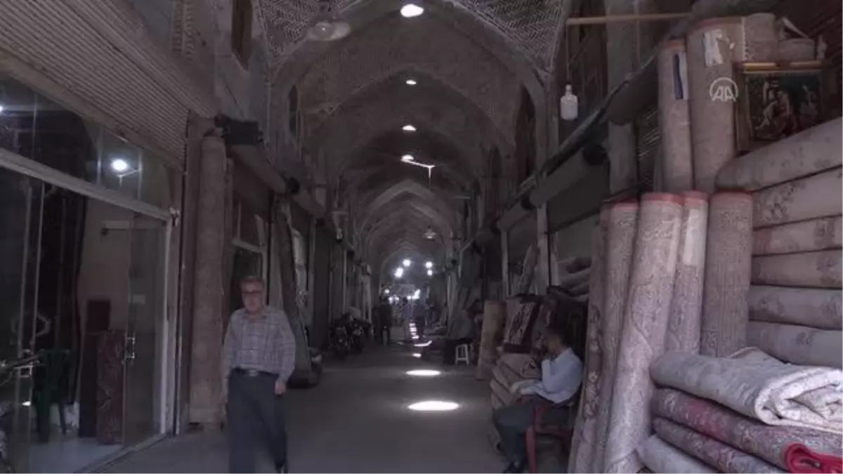 Kazvin eyaletinin tarihi pazarındaki halıcılar eski günlerini arıyor