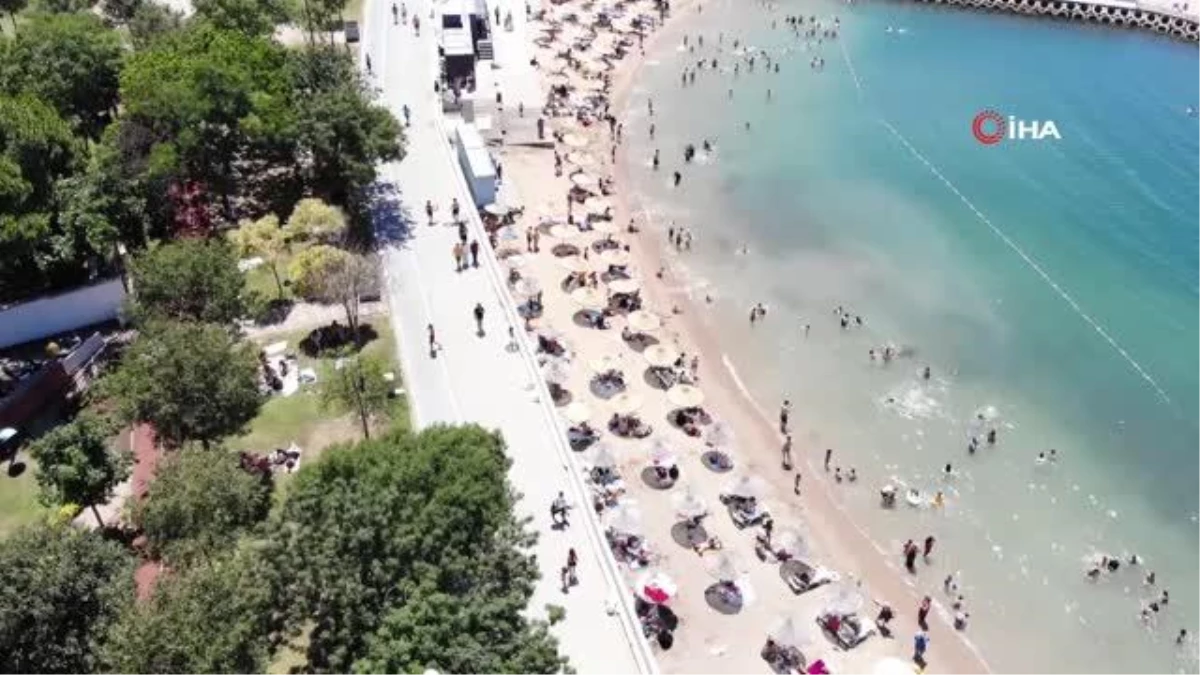 İstanbul\'da termometreler 30 dereceyi gördü, Caddebostan plajı doldu taştı