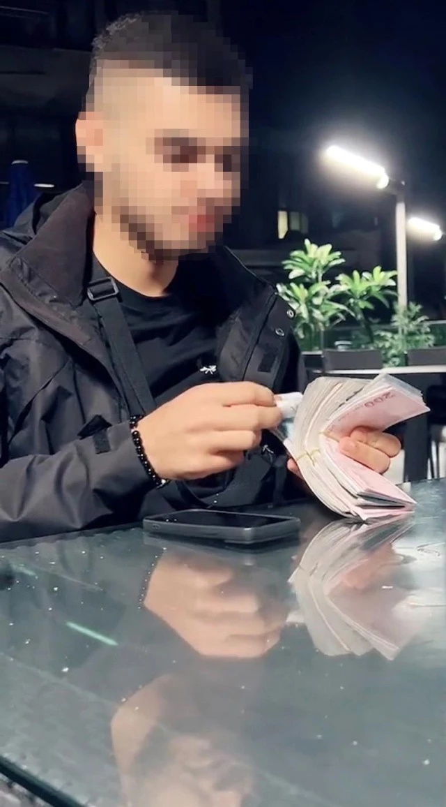 Beyoğlu'ndaki otelin penceresinden tomar tomar dolar saçan şahıs yakalandı