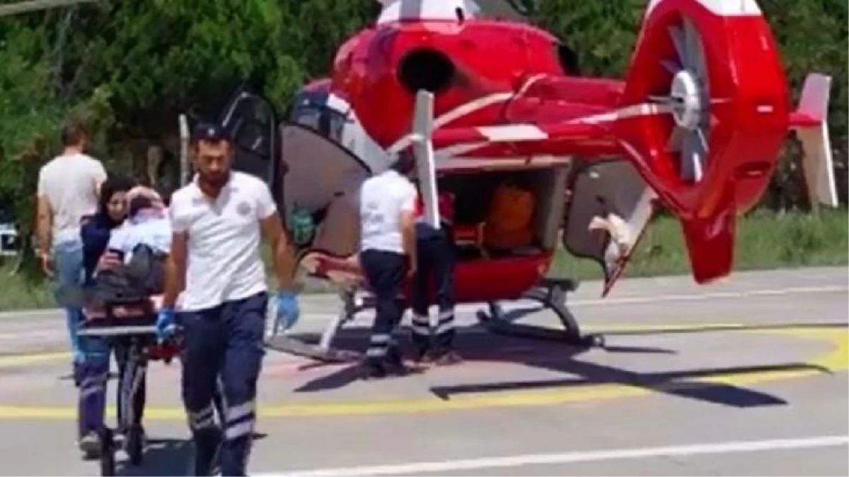 Tarlada hastalanan köylünün yardımın ambulans helikopter yetişti