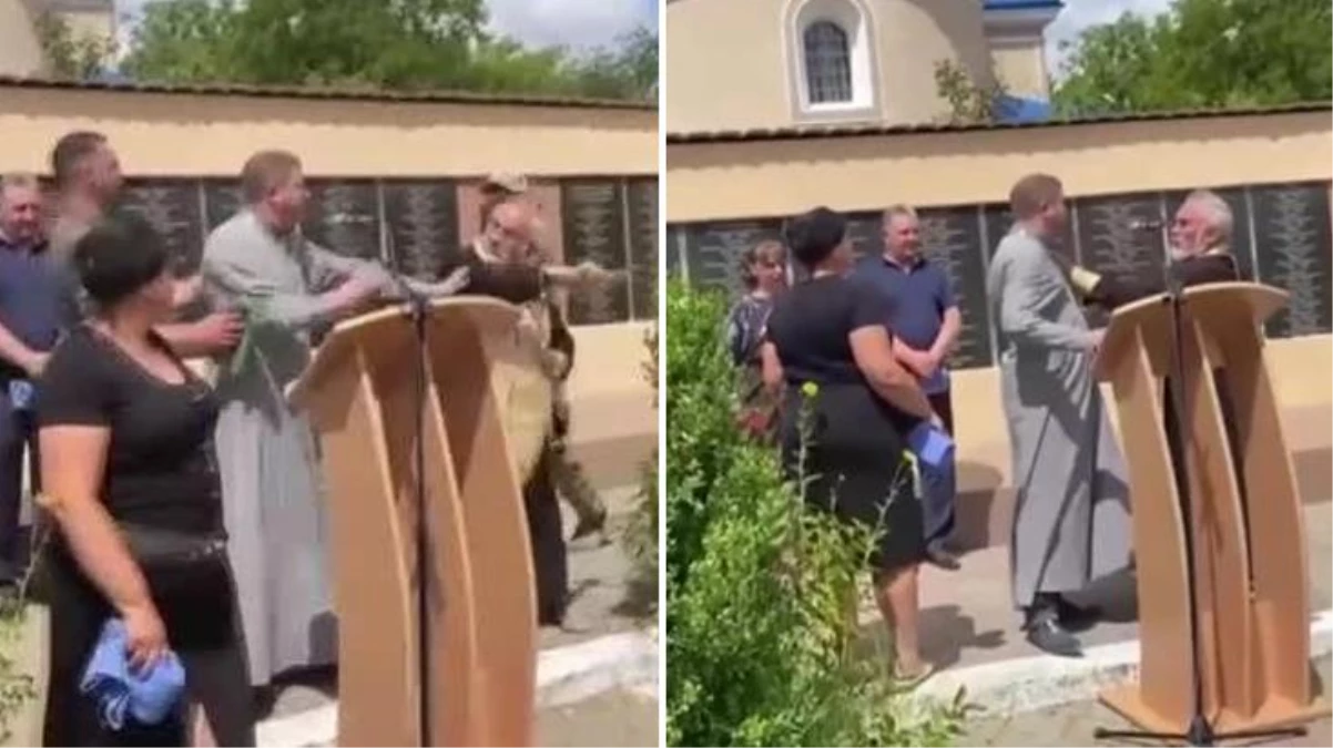 Ukraynalı askerin cenaze töreninde Rus yanlısı rahip, Ukraynalı rahibe haçla saldırdı!