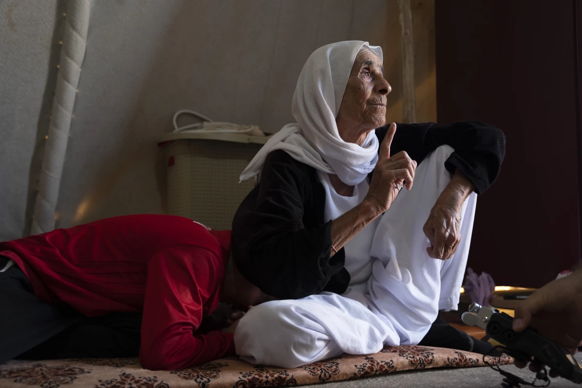 DEAŞ\'ın oğlunu öldürdüğü, aylarca esir tuttuğu 70 yaşındaki Ezidi kadının acısı dinmiyor Açıklaması