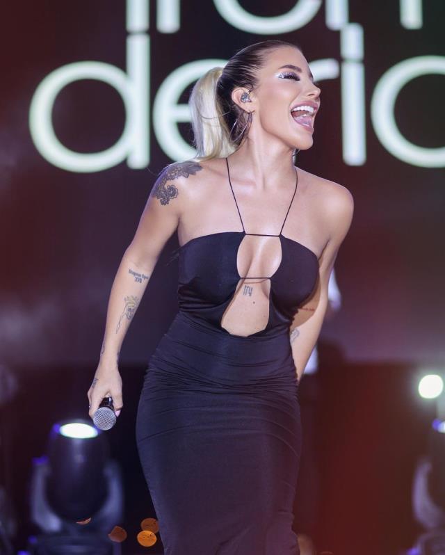 Çılgınlıkta sınır tanımayan İrem Derici, ayak parmaklarının arasına sıkıştırdığı kadehten içki içti