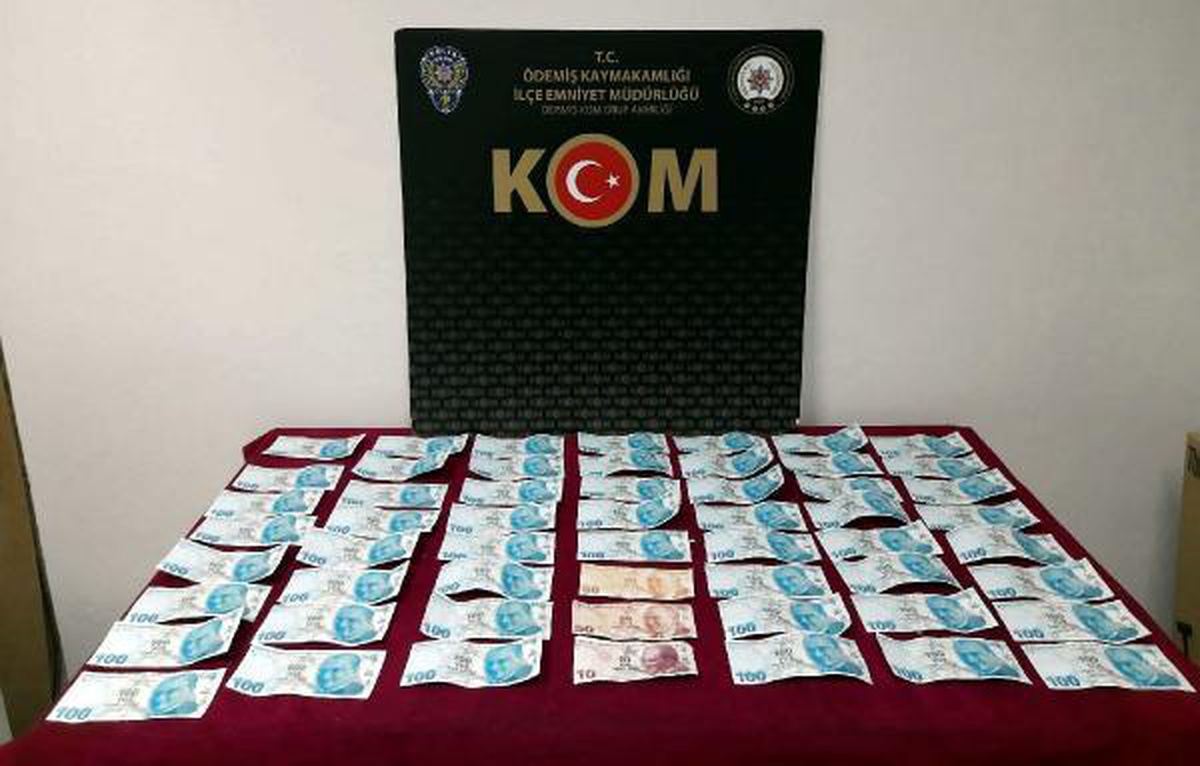 Otomobilinde sahte parayla yakalandı