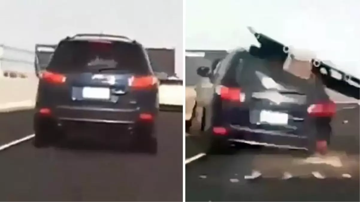 Seyir halinde olan aracının üzerine trafik levhası düştü! O anlar araç kamerasına yansıdı