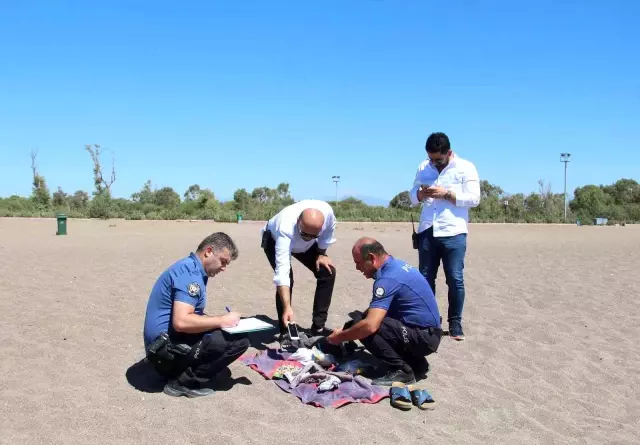 Plajda ölü bulunan gencin telefonunu açmaya kimse cesaret edemedi