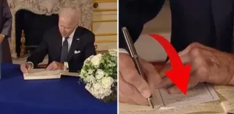 ABD Başkanı Biden, 2. Elizabeth'in taziye defterine not yazarken kopya çekti! O anlar kameralara yansıdı